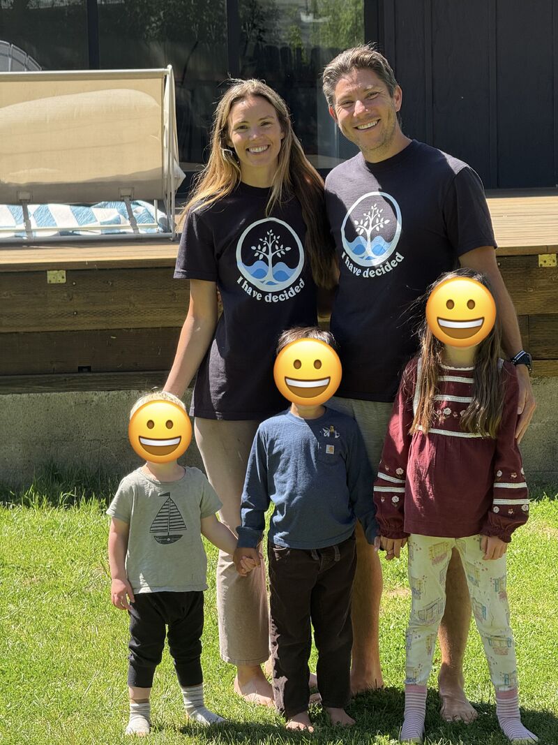 Our family in the backyard, my wife and I wearing matching I Have Decided shirts